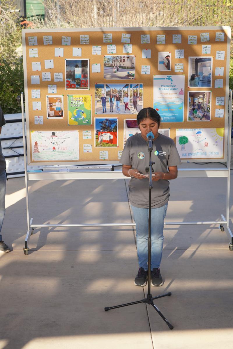 A cohort member presents at the Open House & Student Showcase.