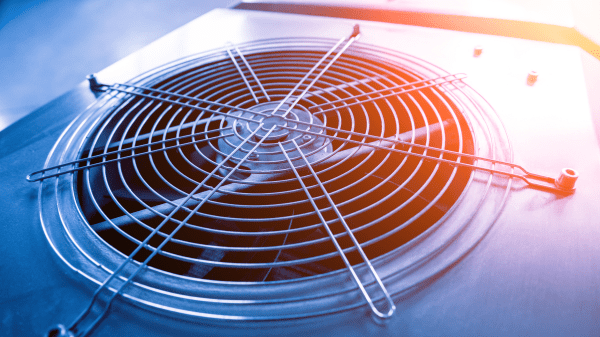 Close-up photo of a cooling fan from an HVAC system