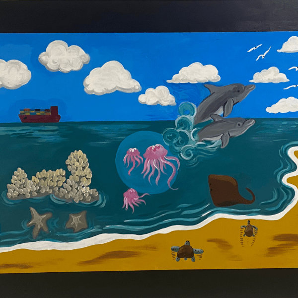 a school hallway mural depicting the beach and near-ocean animals, including dolphins, jellyfish, coral, crabs, and seashells.